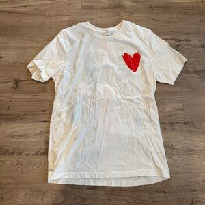 Chic White Tee with Red Heart Detail